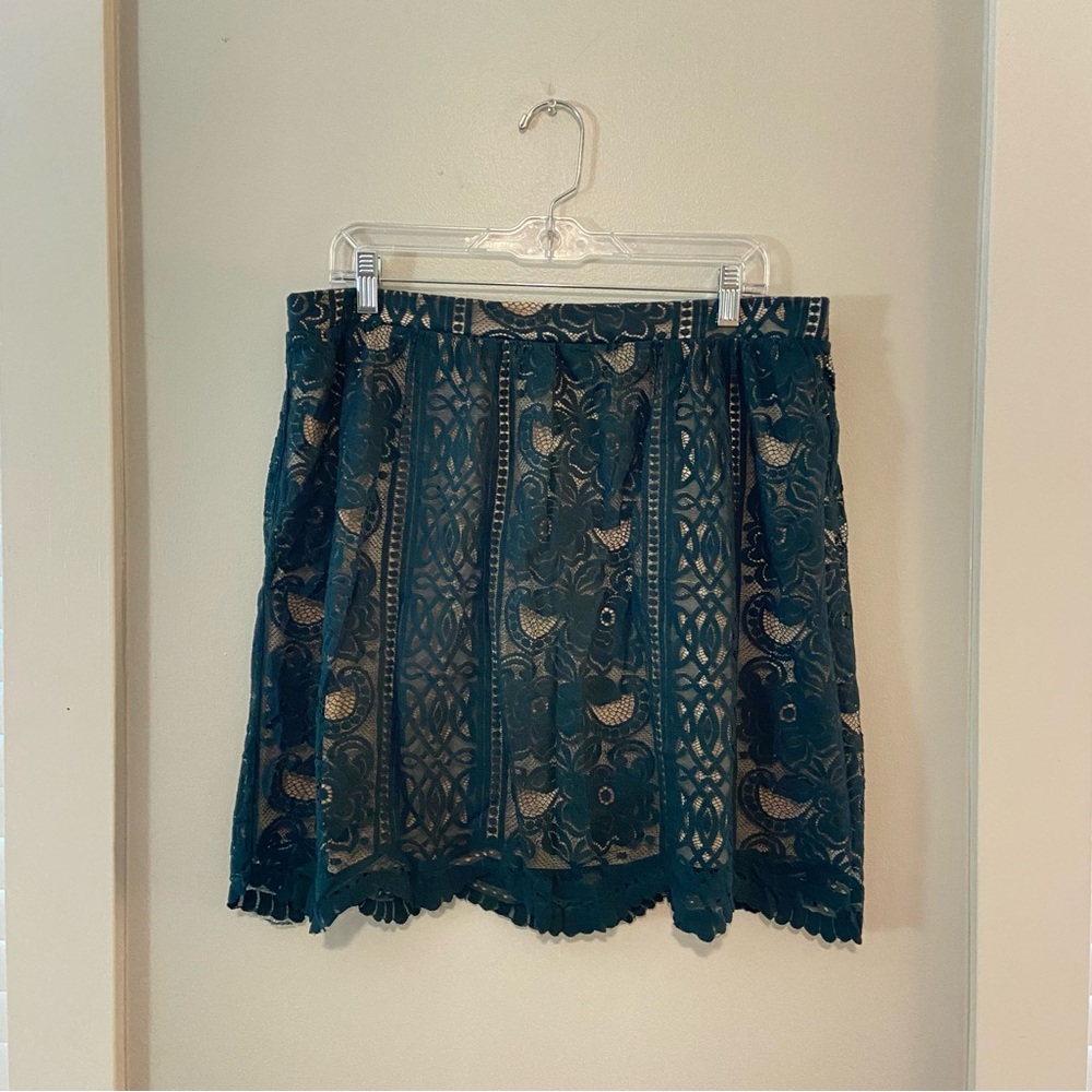 Dark green lace mini skirt
